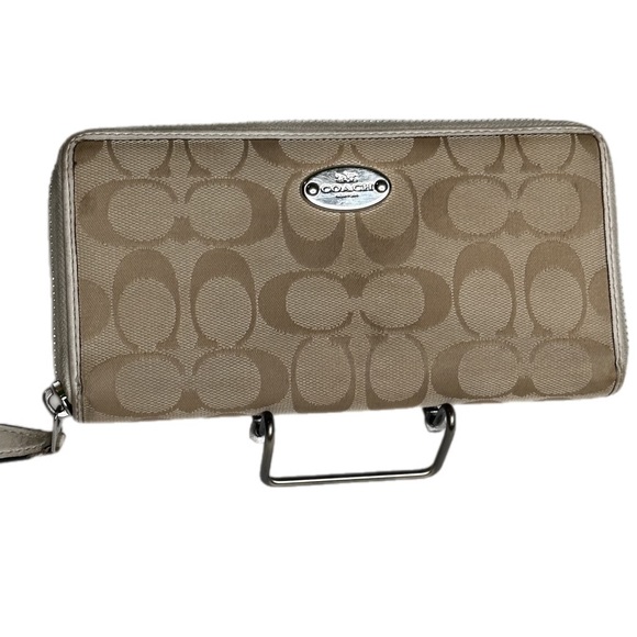 Coach Handbags - Coach Signature Leather Zip Around Wallet